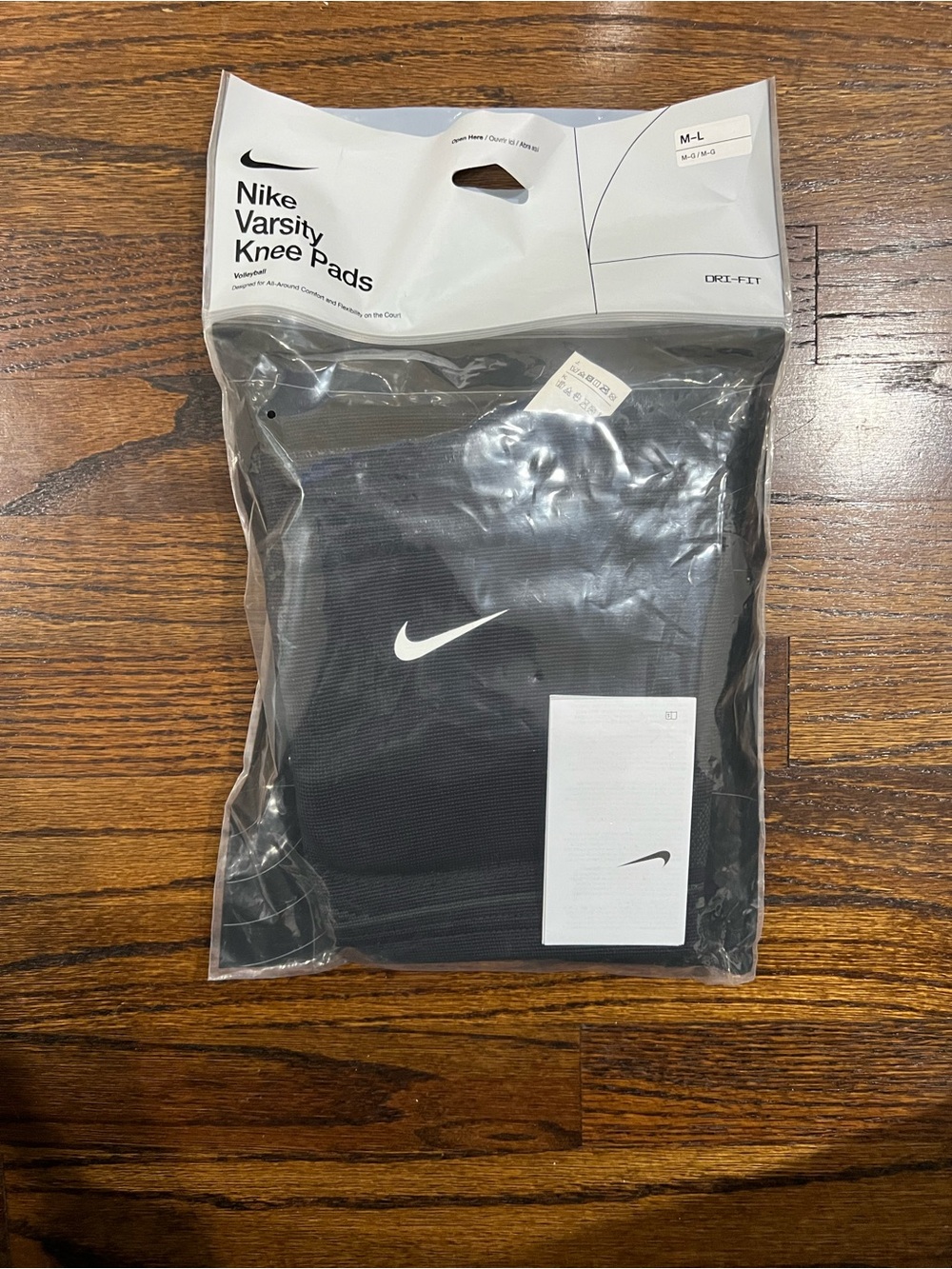 Nike Varsity Volleyball Knee Pad featuring a prominent white Nike Swoosh